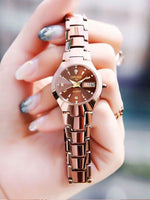 Oruss marca quente relógio feminino de alta qualidade aço inoxidável à prova dwaterproof água ponteiro luminoso semana calendário eleganc relógio quartzo feminino