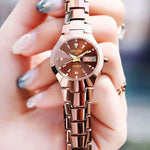 Oruss marca quente relógio feminino de alta qualidade aço inoxidável à prova dwaterproof água ponteiro luminoso semana calendário eleganc relógio quartzo feminino